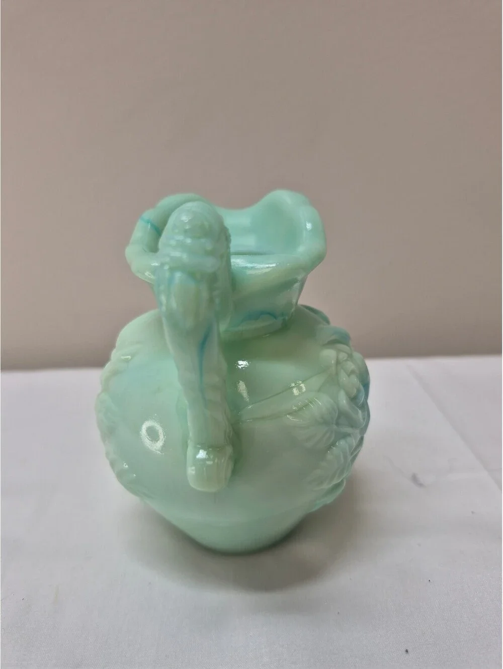 Vintage Avon Light Green Milk Glass Pitcher with Raised Floral Design J36